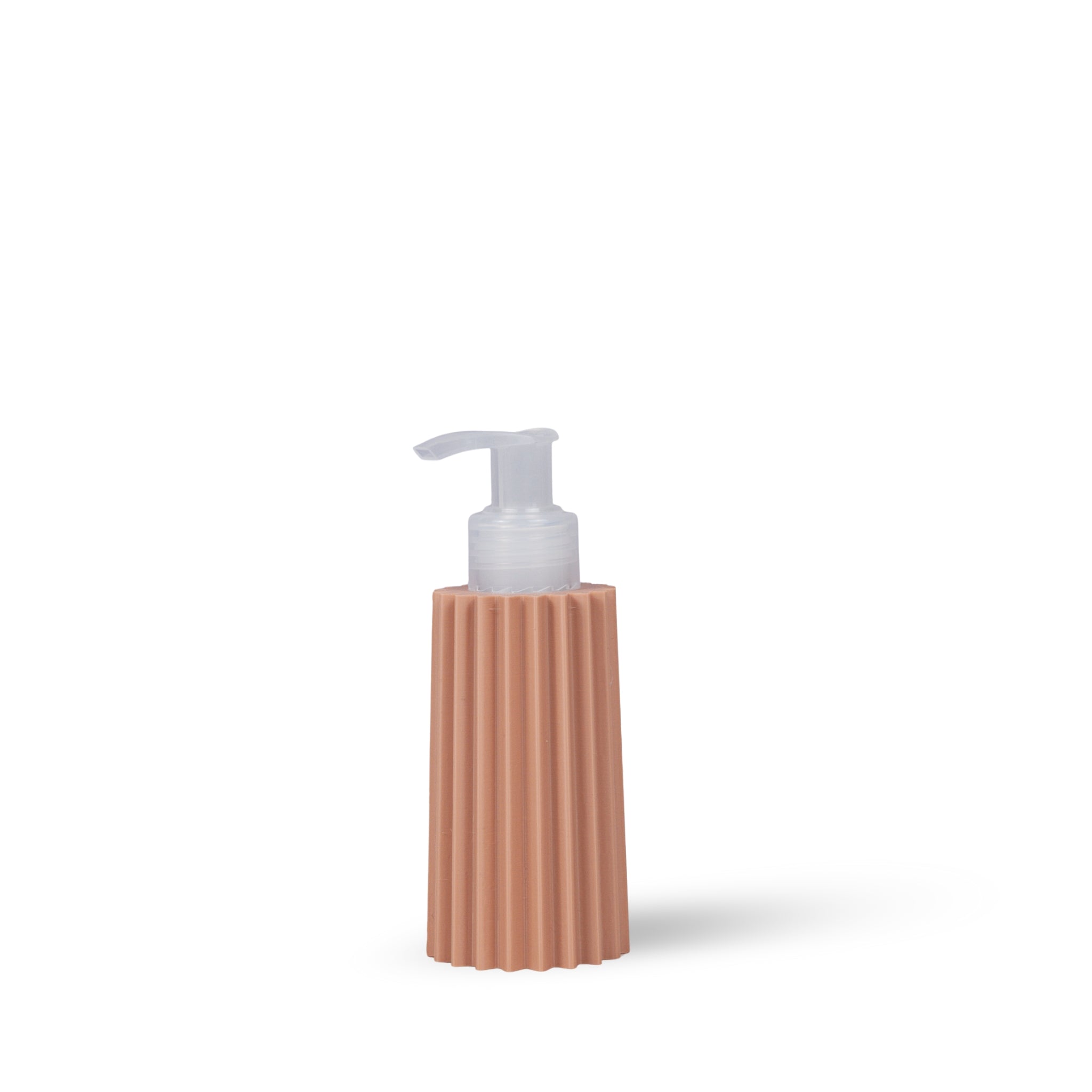 lotion pump bottle with ribbed rose color design on a white background