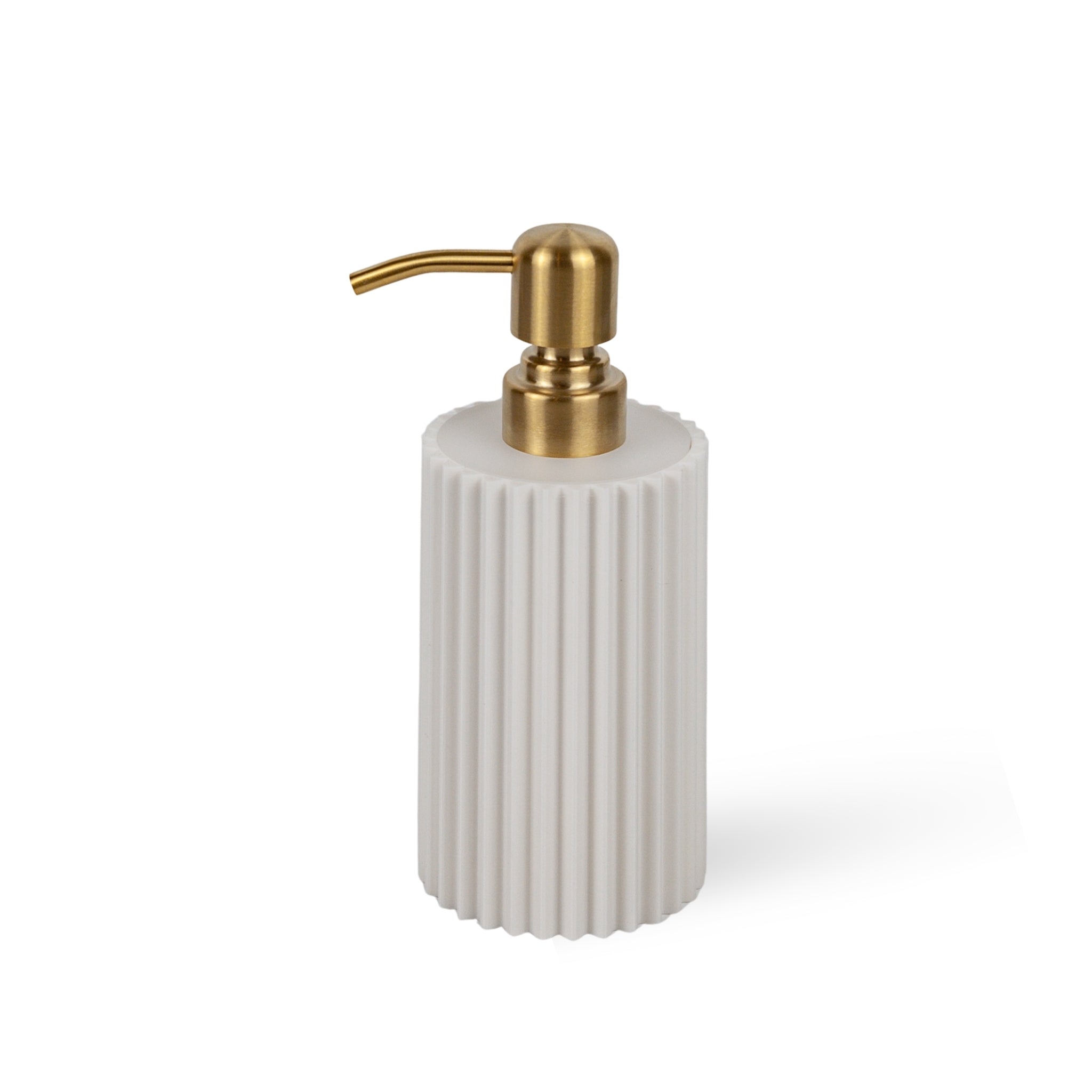 White ribbed soap dispenser with gold pump on a white background