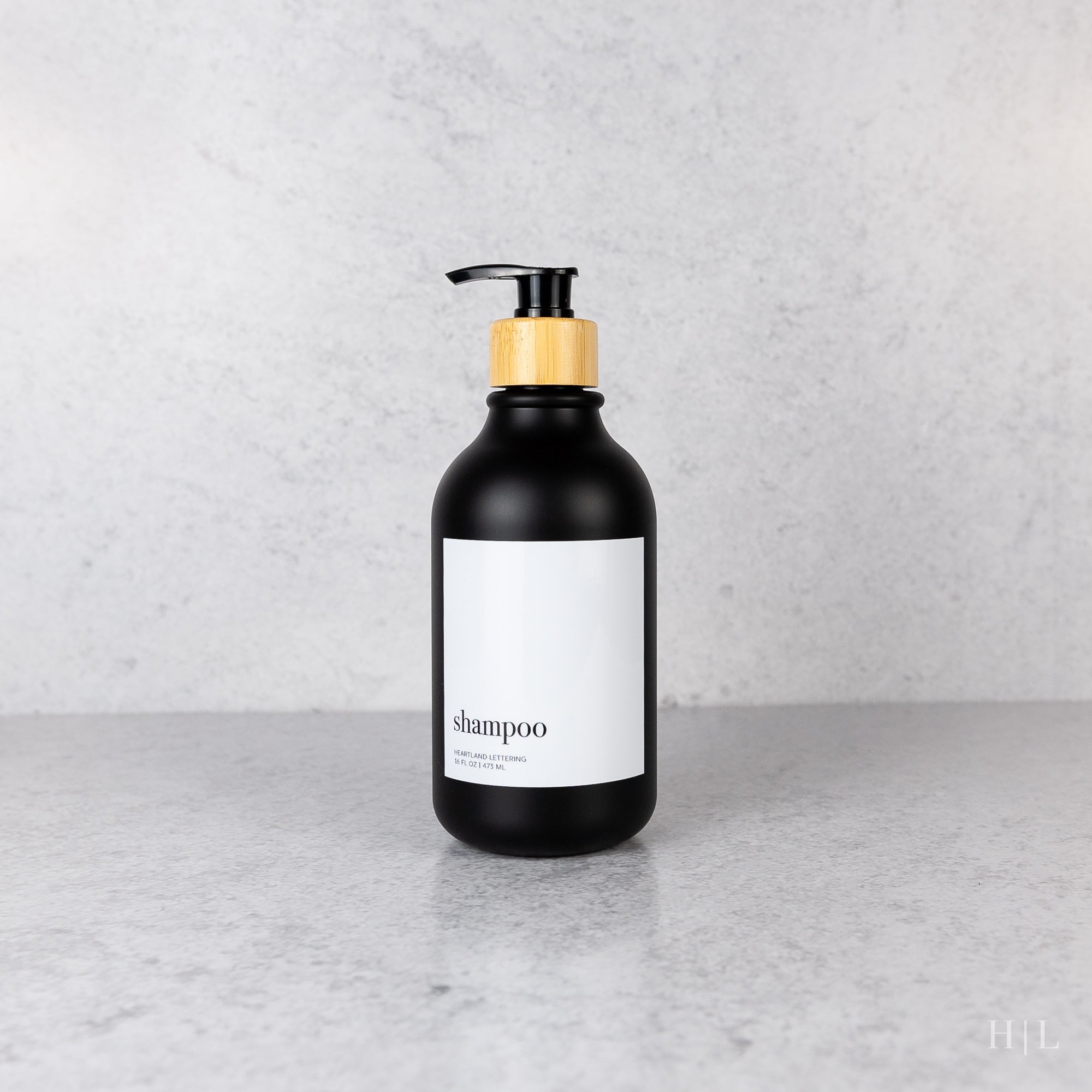 a bottle of shampoo sitting on a counter