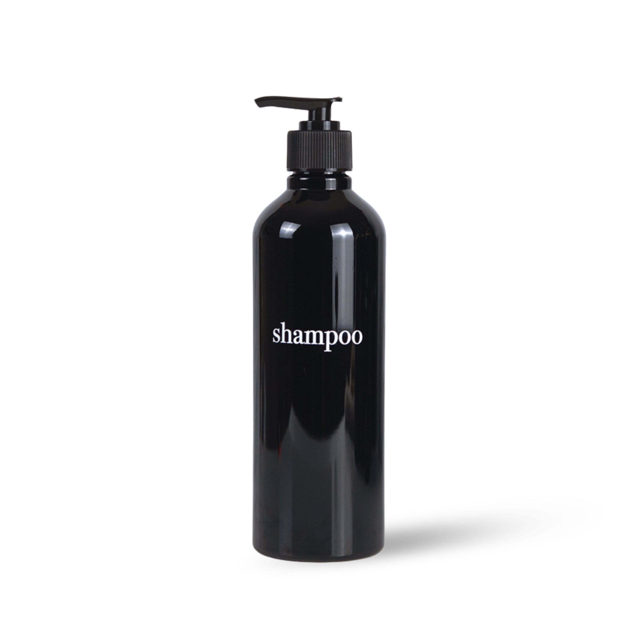 black shampoo pump bottle on white background