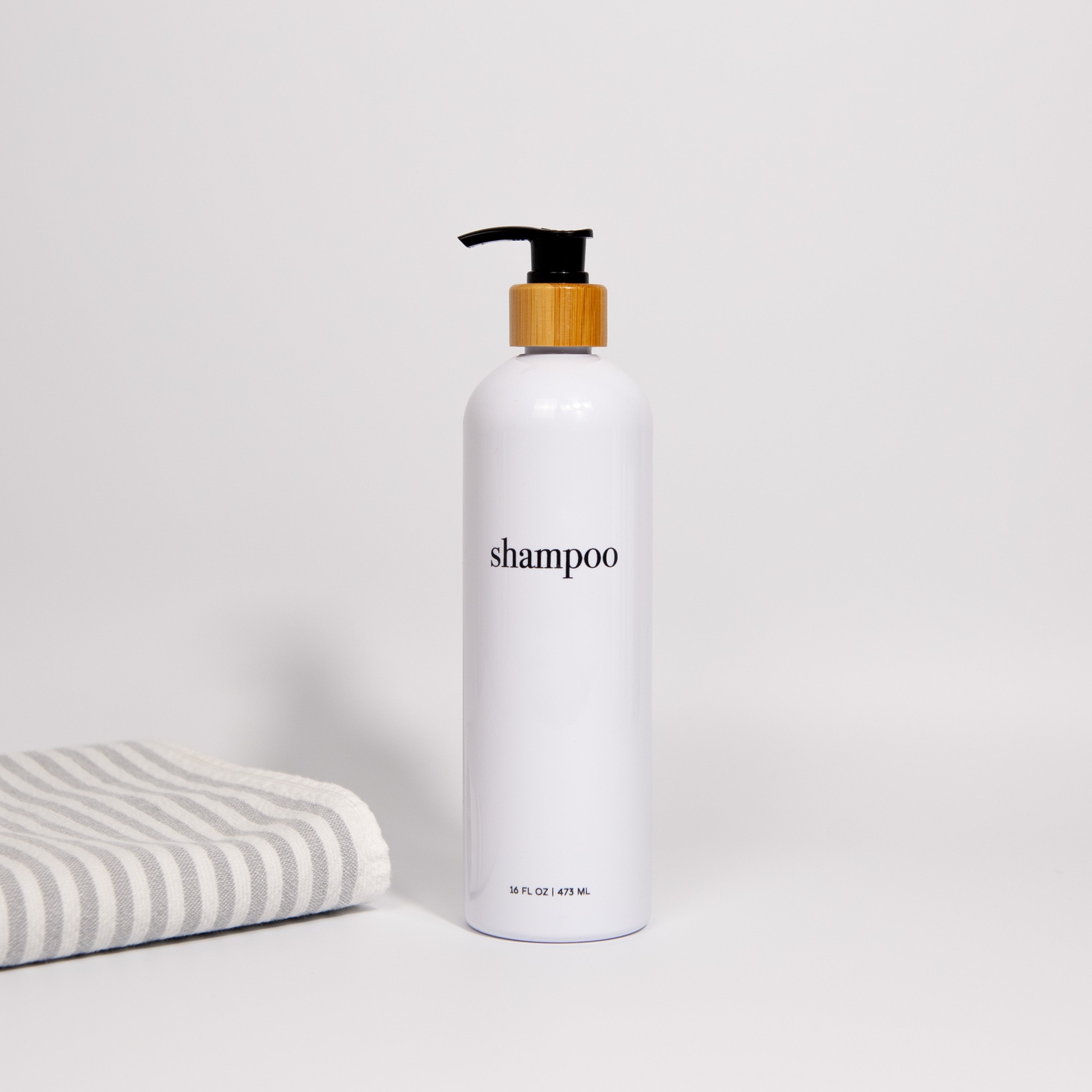 Hamptons Collection White Minimalist Slim Printed Shower and Soap Dispenser Bottles