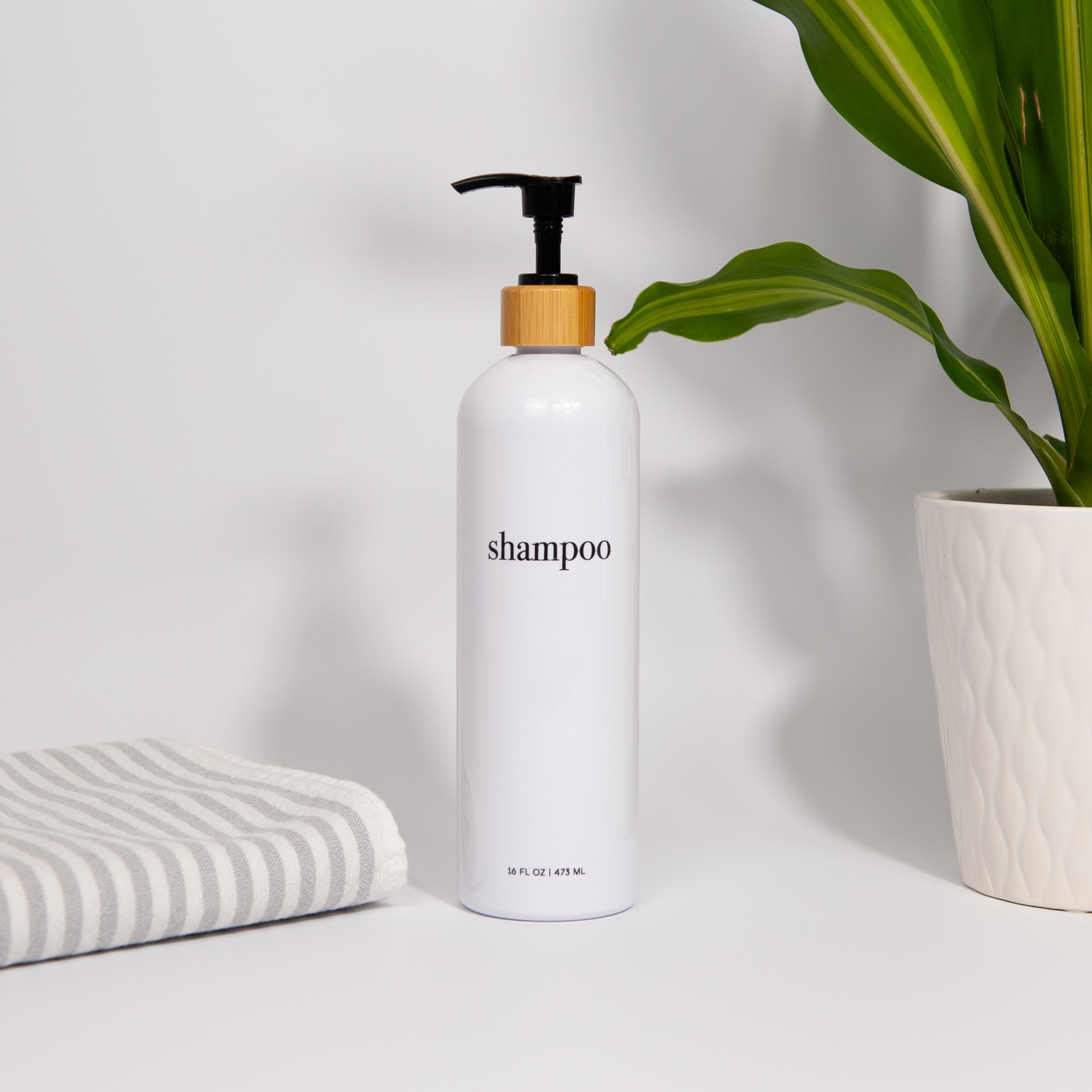 Hamptons Collection White Minimalist Slim Printed Shower and Soap Dispenser Bottles
