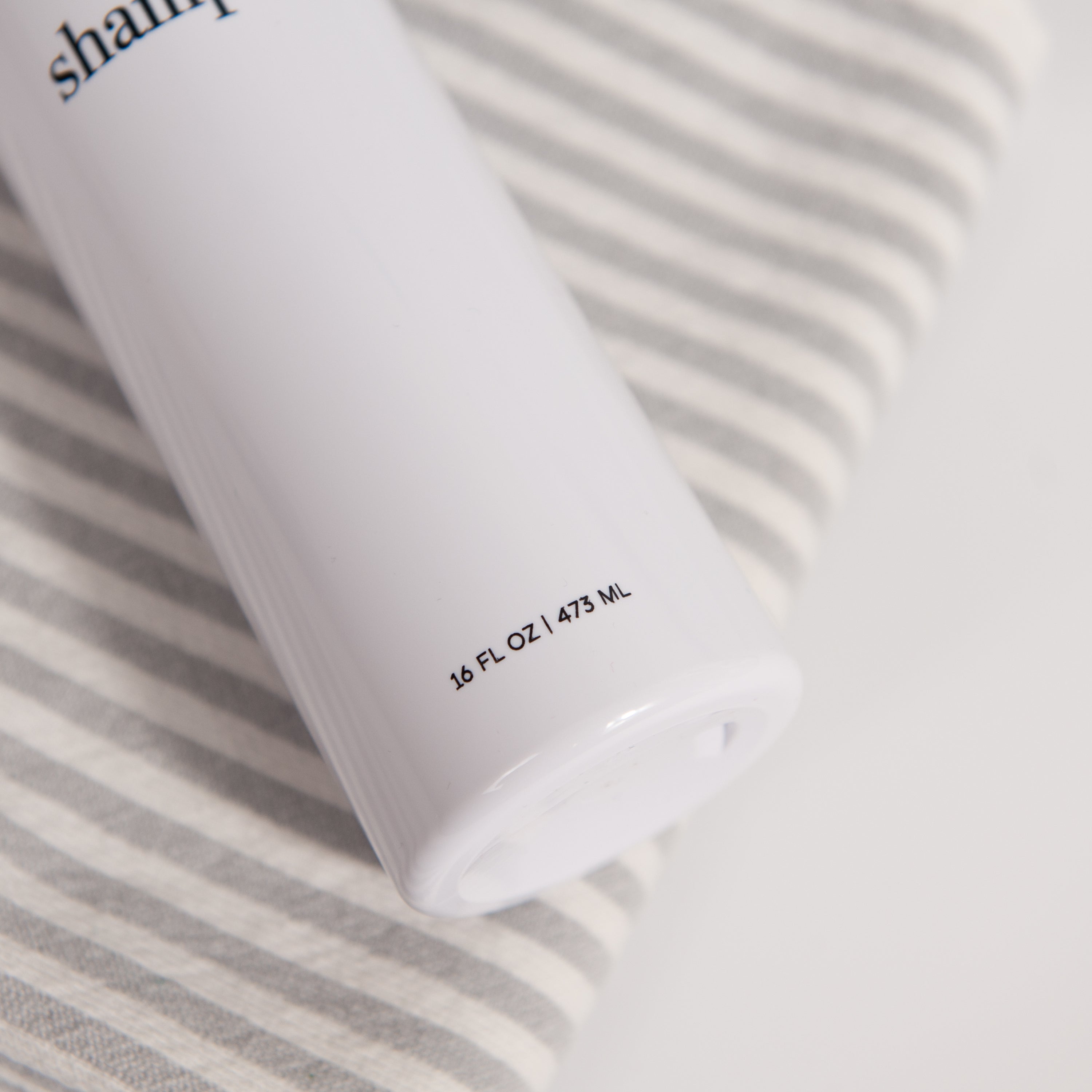 Hamptons Collection White Minimalist Slim Printed Shower and Soap Dispenser Bottles