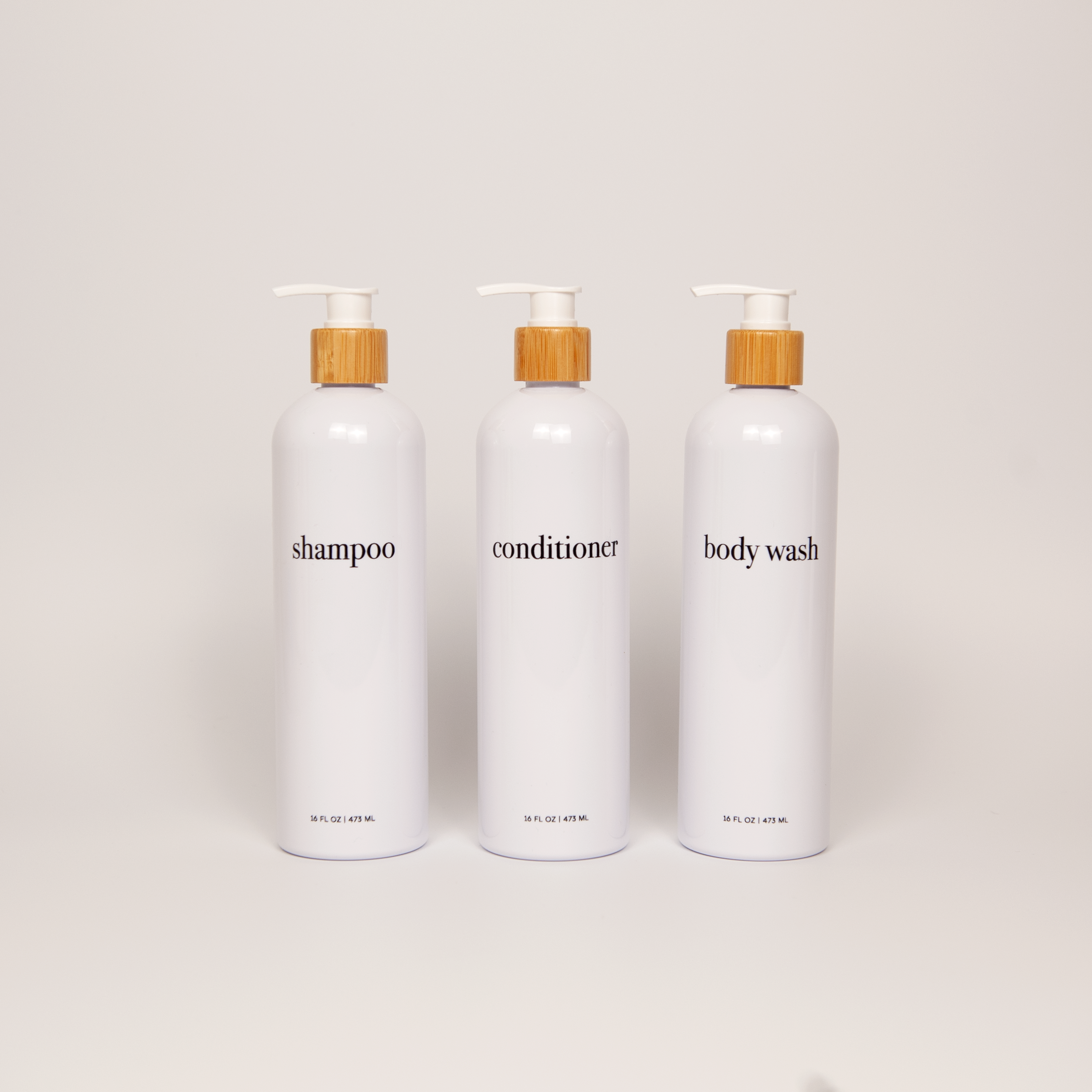 Hamptons Collection White Minimalist Slim Printed Shower and Soap Dispenser Bottles