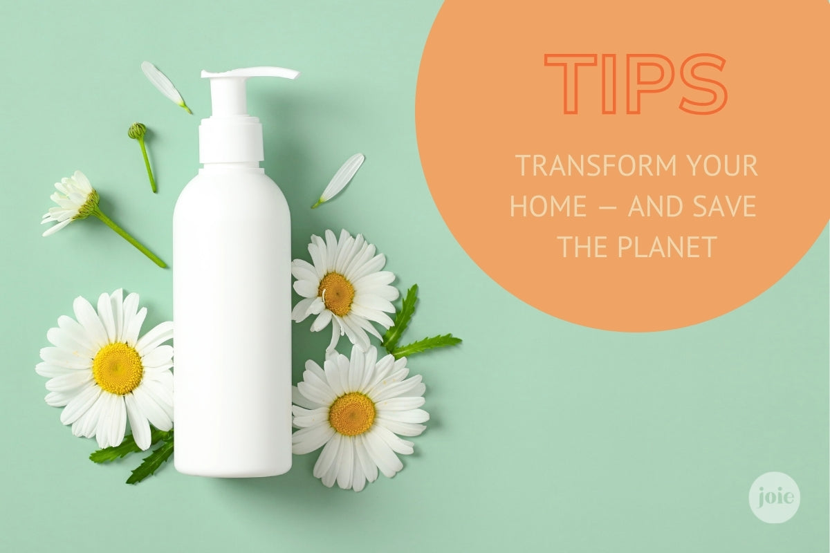 Refillable pump bottle and daisy flowers on a teal background