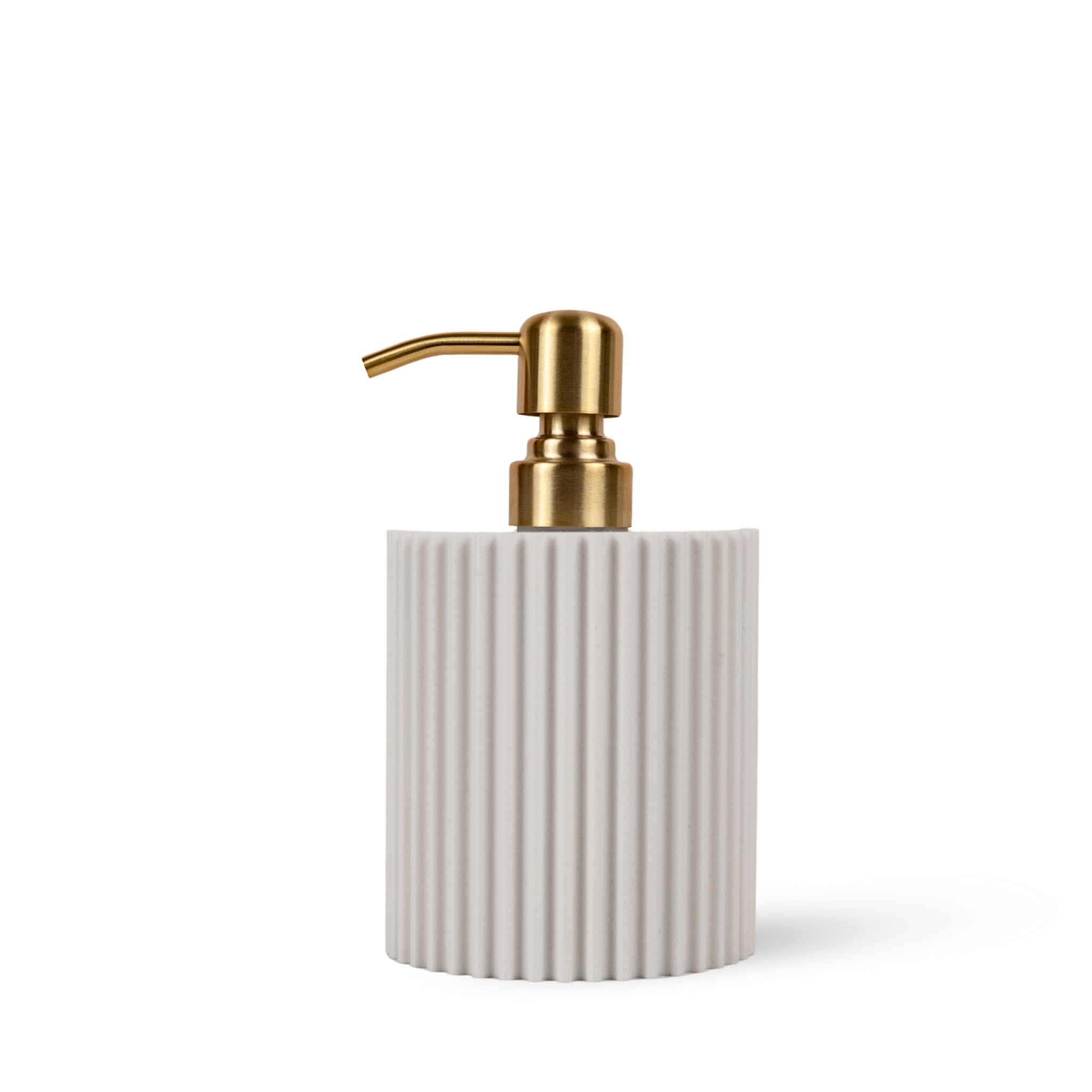 Soap dispenser with gold pump on a white background