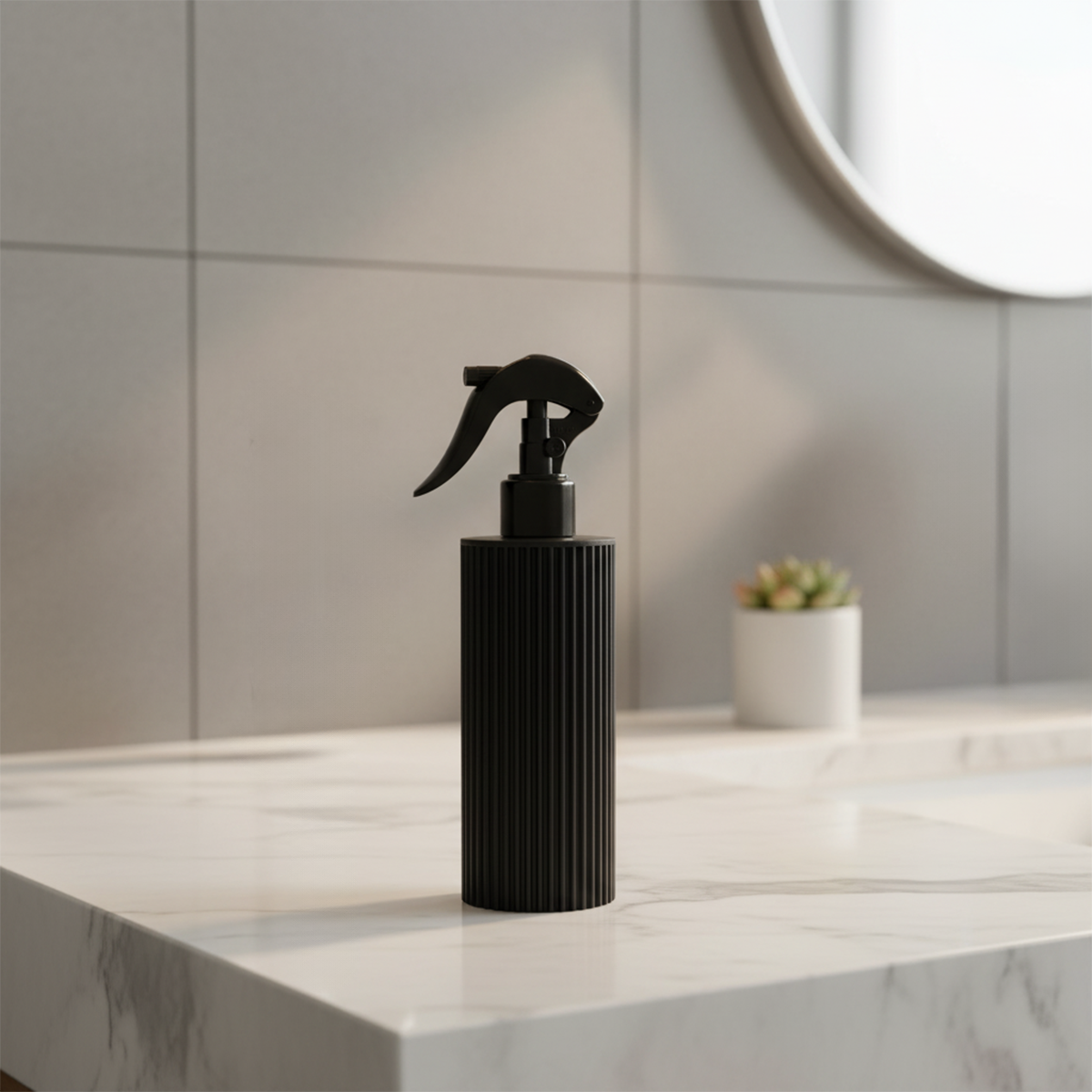 Black spray bottle on a marble countertop with a blurred background