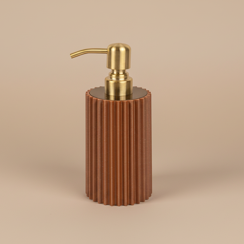 Bronze espresso Soap dispenser with gold pump on a beige background